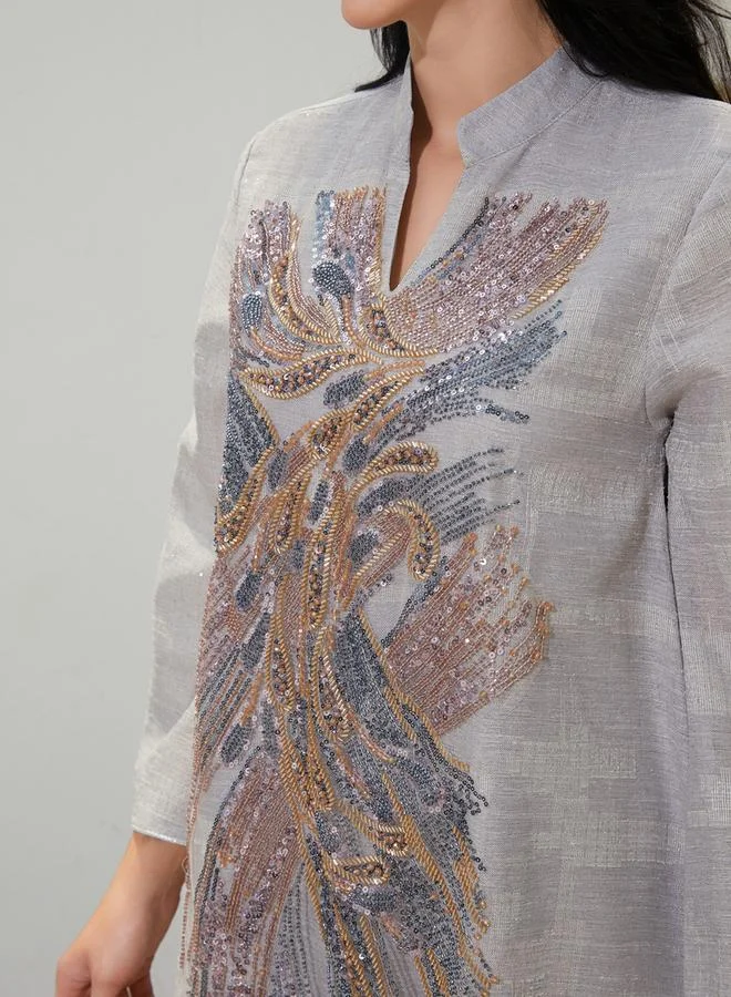 تايك تو جلابية نسيج بارز بتفاصيل رقع الترتر وقصة واسعة